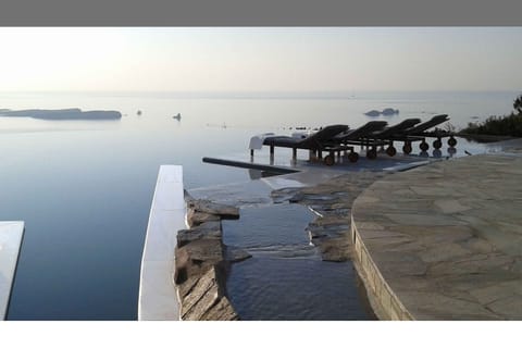 Private infinity pool overlooking the Aegean — unforgettable sunsets