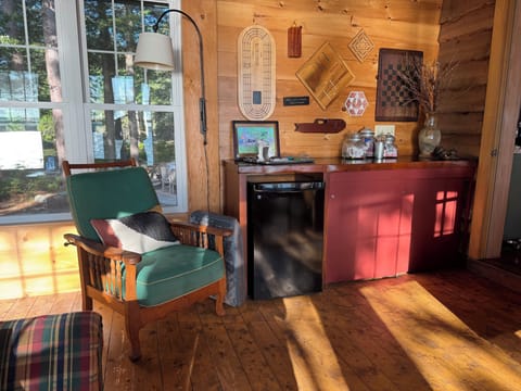 Sunroom with dry bar, armoire stocked with games & tv