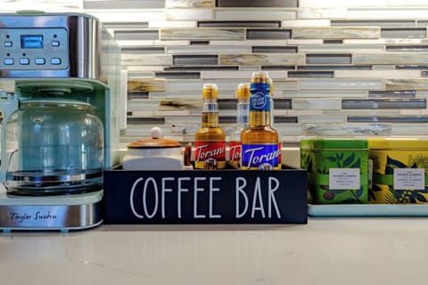 Coffee & Tea Bar! Includes breakfast blend coffee, variety of flavoring syrups, creamer and sugar. As well as a variety of organic teas.