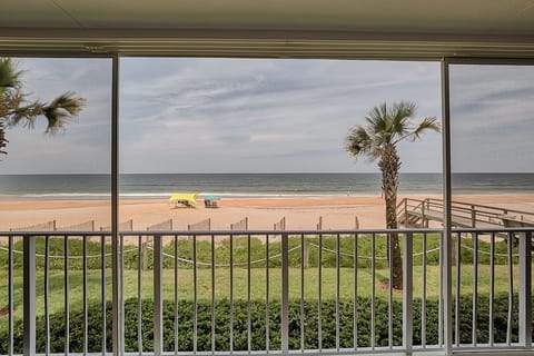 Wake up to this view. Steps to a quiet beach