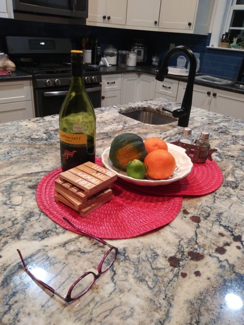 Kitchen is fully stocked. Gas range and oven. Granite tops and large island.