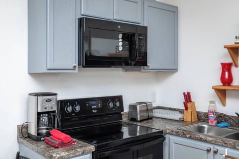 Coffeemaker and fully stocked kitchen