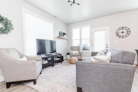 Living Room with comfortable seating and 55" TV