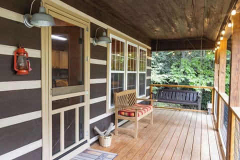 The old fashioned porch door-notice our namesake- Red Lantern Lodge!