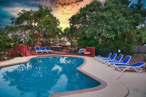 Enjoy the hot tub and swimming pool with family and friends.
