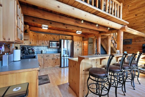 Enjoy the open floor plan!  There is seating for 4 at the bar.