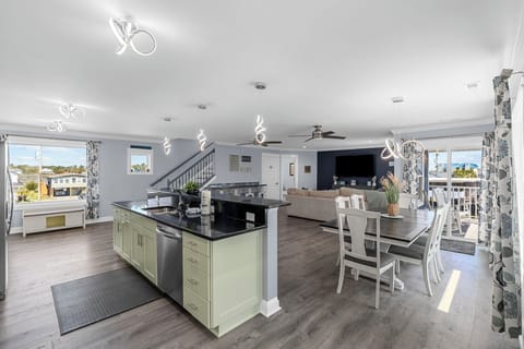 Dine in elegance in this soothing space, adorned with contemporary touches and bathed in natural light, creating a perfect blend of comfort and style.