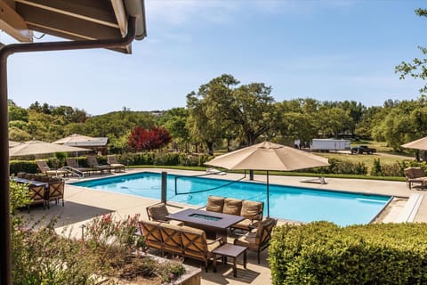 Large pool deck with resort style furniture