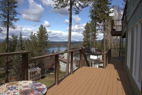 Peaceful lake & mountain views from the private deck, enjoyed year-round.