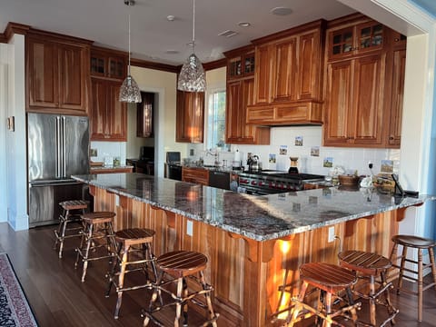 12 and 8 foot counters for  food prep or casual eating. Study off kitchen .
