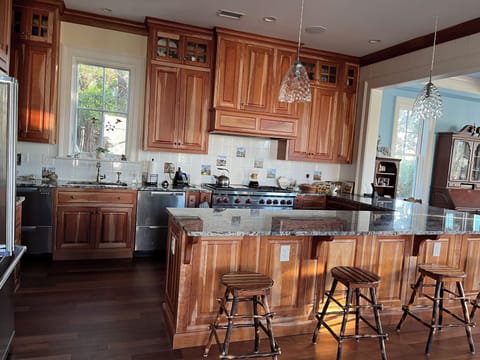 Amish Cherry Kitchen  with Wolf double oven, griddle & broiler. 2 dishwashers.