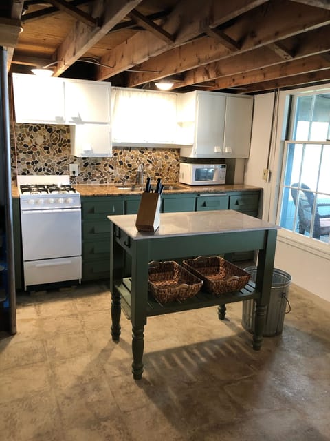 Apartment size fridge just out of view. No dishwasher. Sorry! 