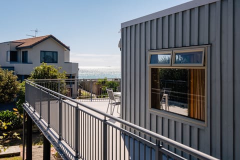 This property is located one back from the beach and enjoys tranquil sea views. 