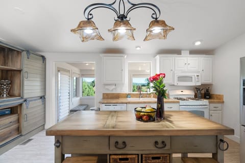 Enjoy the company and the view at the island in the kitchen