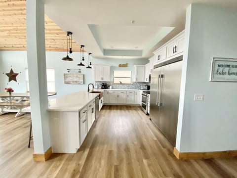 Huge refrigerator freezer and quartz’s counters