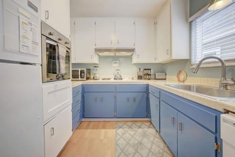 Kitchen: Newly renovated kitchen with all new sink, oven, microwave, and countertops. Lot's of counter space for cooking. We supply you with lot of spices, olive oil, salt & pepper, and all the cooking pots and pans you might need to make a meal. 