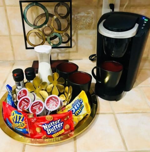 Kitchen amenities , keurig, and hot tea plus delicious snacks.