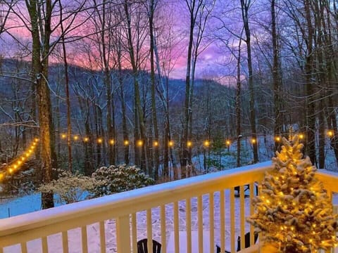 Snowy sunset view from the deck/patio area.