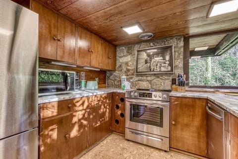 The newly update kitchen with extremely high standards including everything you need to entertain. New Ceramic dishes, beautiful glassware, and expertly restored original cabinets.