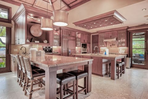 Chef's kitchen with state of the art WOLF appliances and Miele coffee machine