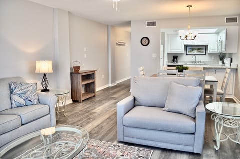 Living room that has sleeper sofa and sleeper love seat 