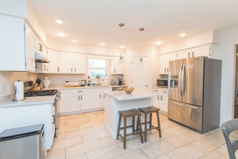 Big kitchen with modern appliances and everything you may need for cooking