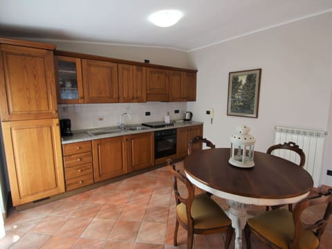 Brown, Cabinetry, Countertop, Furniture, Property, Table, Chair, Drawer, Wood, Building