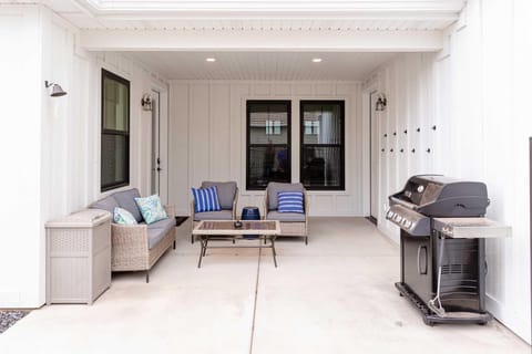 outdoor patio seating with grill