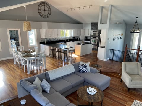 Top floor living, dining, and kitchen area.