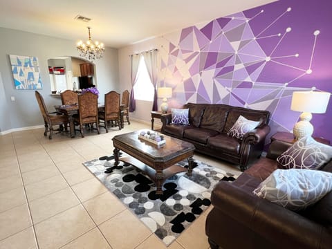 Purple Wall inspired by the Magic Kingdom icon is a bright welcome to the home.