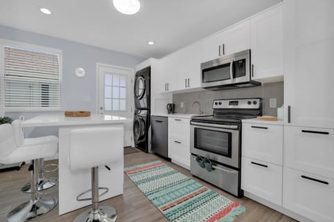 Well organized kitchen to show off your culinary skills.