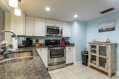 Fully stocked kitchen with all the pans and equipment of the highest quality.