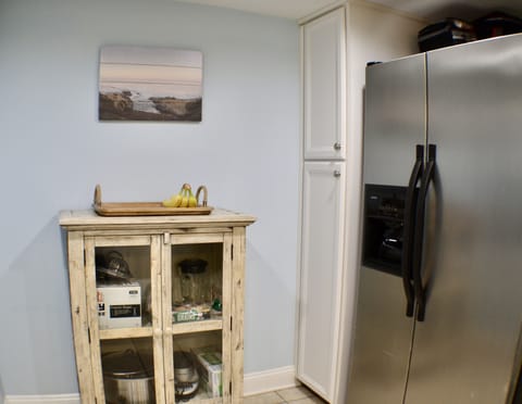 Crockpot, mixer, other small appliances provided.