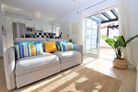 Lounge/Living room next to the kitchen and roof terrace