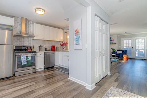 View of the kitchen and living room from the front door