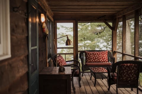 Large screen porch for relaxing by the lake