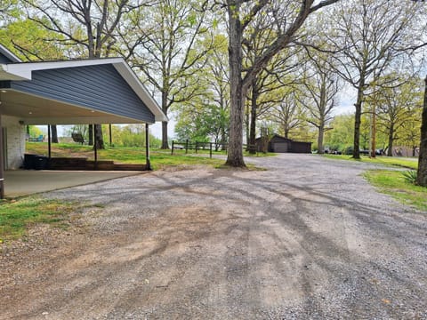 Guest parking is past the carport on the left