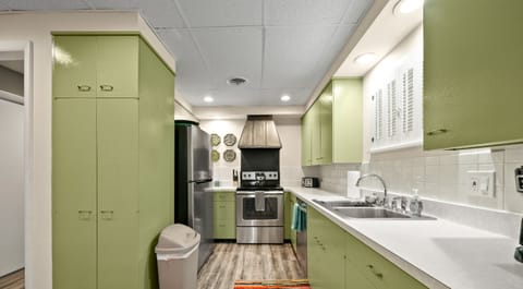 Full kitchen in Fire Suite with electric stove and dishwasher