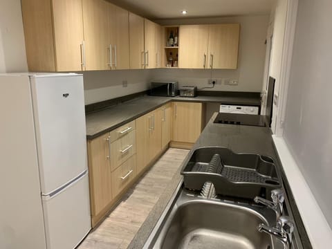 The kitchen is well equipped with cooking and hosting essentials.