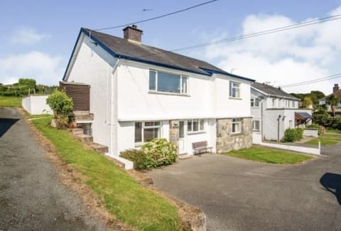 Front of house with parking