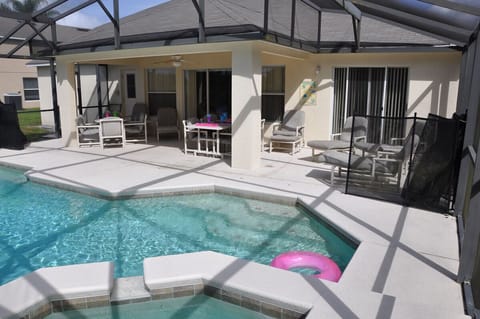 Large beautiful pool and spa with covered lanai and plenty of seating for all.