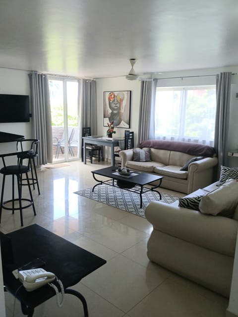 Spacious lounge leading onto balcony 