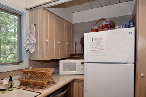 If you just cannot fit anything else in the kitchen refrigerator there is also a spacious auxiliary fridge downstairs for your convenience.