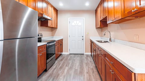 Kitchen with cooking wares and utensils