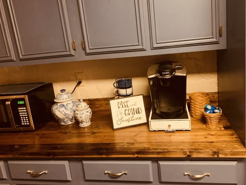 Coffee bar stocked with KCups and creamer 