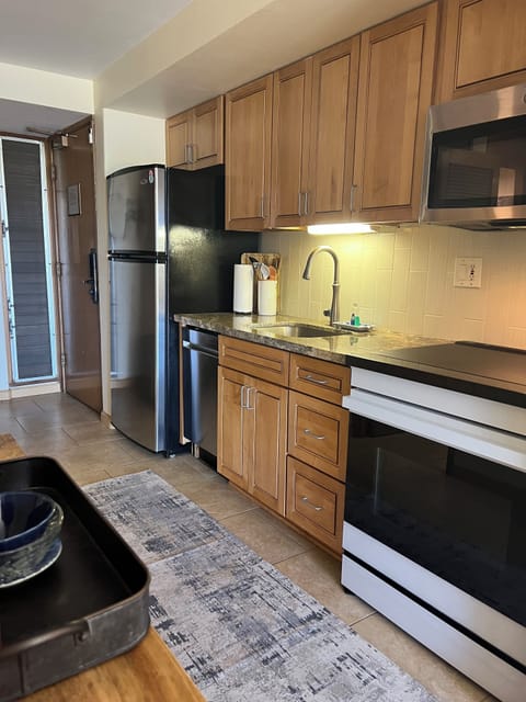 Updated kitchen. Solid granite countertops. 