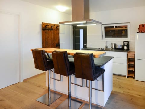 Cabinetry, Chair, Countertop, Kitchen Appliance, Wood, Interior Design, Flooring, Floor, Kitchen, Building