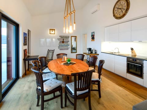 Table, Furniture, Property, Picture Frame, Chair, Wood, Interior Design, Lighting, Orange, Floor
