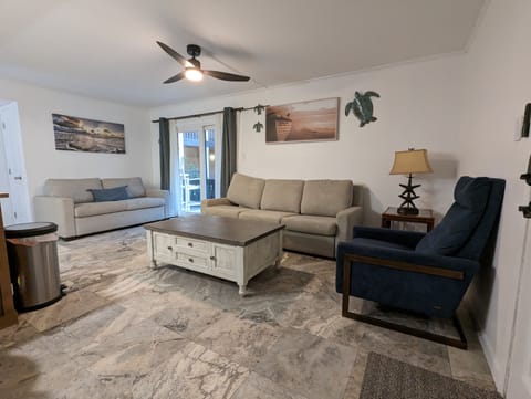 Living room with American Leather sofas and recliner
