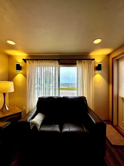 Living room with a sofa and love seat.